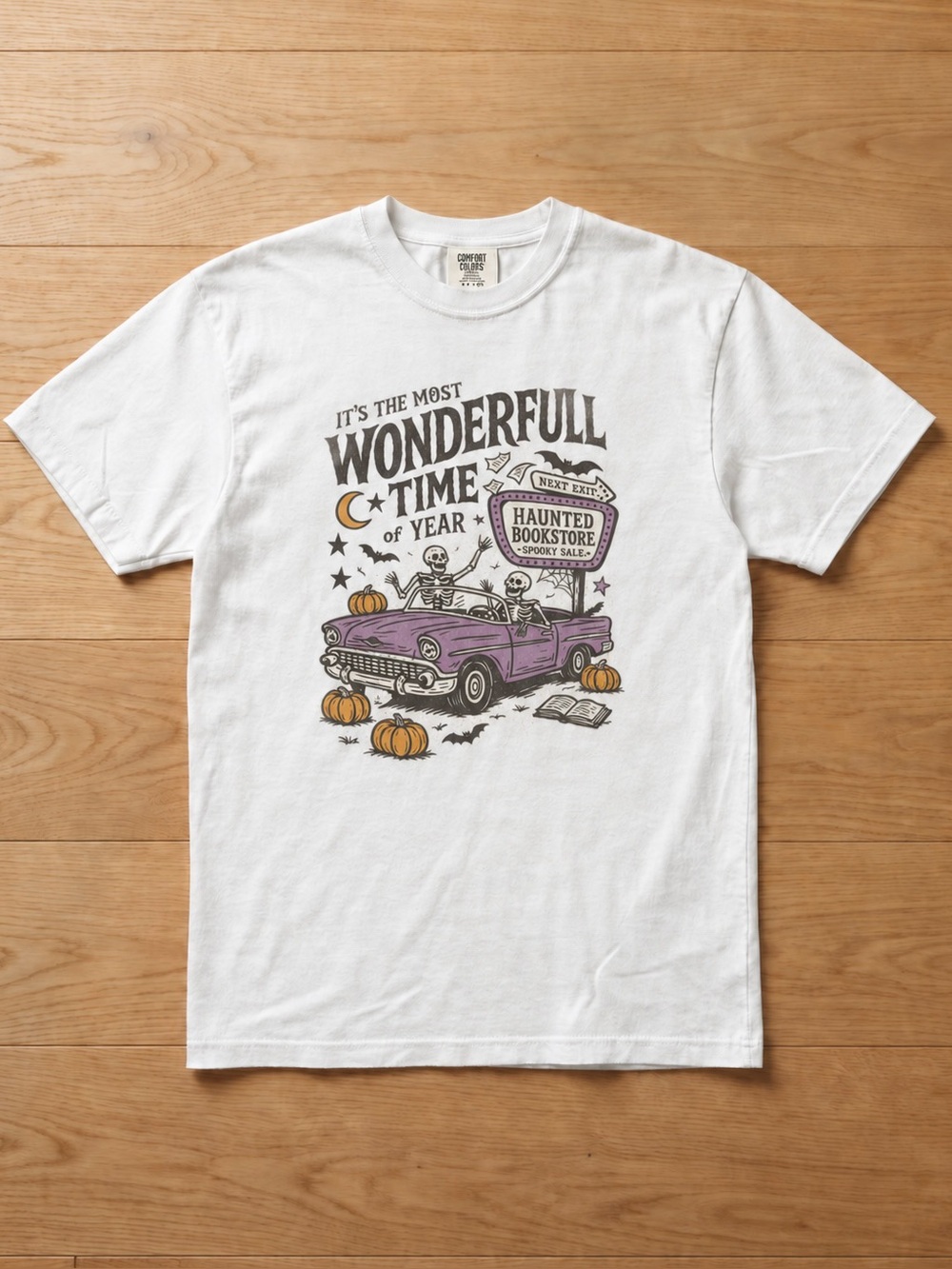 Skeleton Haunted Bookstore Car White Spooky Bookish Comfort Colors Reprint Tee